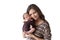 Young woman holding a newborn baby in her arms on the white background. Newborn photosession. Family portrait