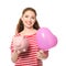 Young woman holding piggy bank and heart shaped balloon on white background. Money savings concept