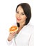 Young Woman holding Smoked Salmon and Cream Cheese Bagel