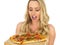Young Woman Holding a Whole Baked Pizza on a Wooden Serving Board