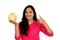 Young woman holding world globe against white