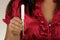 Young Woman Holds a Tampon (1)
