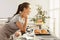 Young woman with homemade oven baked pastry