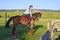 Young woman on horseback