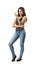 Young woman in jeans and gray top standing in half-turn with right arm across belly and left arm bent in elbow and