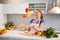 Young woman juggle with vegetables