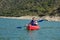 Young woman with a kayak