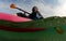 Young woman in kayak on ocean