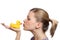 Young woman kissing the yellow rubber duck