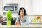 Young woman in kitchen