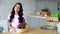 Young woman on kitchen. Vegetarian Life.