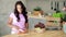 Young woman on kitchen. Vegetarian Life.