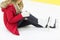 Young woman with knee trauma on skating rink