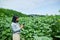 Young woman learning how to pilot her drone in, female using, piloting