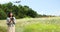 Young woman learning how to pilot her drone in, female using, piloting