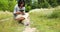 Young woman learning how to pilot her drone in, female using, piloting