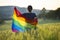 Young woman with LGBT flag