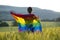 Young woman with LGBT flag