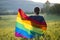 Young woman with LGBT flag