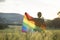 Young woman with LGBT flag