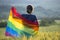 Young woman with LGBT flag