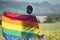 Young woman with LGBT flag