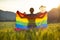 Young woman with LGBT flag