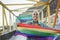 Young woman lgbt rainbow flag outdoor during coronavirus outbreak - Focus on face