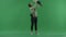 A young woman lift her child on the green screen