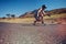 Young woman longboarding on a road