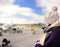 Young woman looking at aircraft in International airport