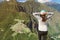 Young woman looking on Machu Picchu