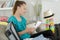 young woman looking worried reading letter