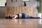 Young woman lying on her back after a home workout routine