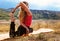 Young woman make flexible yoga exercise