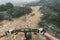 Young woman making downhill with her mountain bike