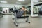 Young woman making torsion exercise in gym