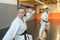 Young woman and man karateka training