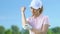 Young woman massaging bruised elbow after golf tournament, professional injury