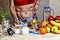 Young woman measures. Detox. Young girl measures the waist and uses proper nutrition. Detox drinks, ingredients, dumbbells. Concep