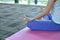 Young woman meditating in front of mirror in yoga room, Yoga con