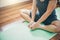 Young woman meditation while practicing yoga indoor