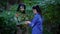 Young woman meeting mother earth in forest, nature unity, safe environment