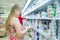 Young woman in milk products department