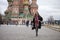 Young woman in a mink coat on the Red Square in Moscow