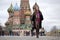 Young woman in a mink coat on the Red Square in Moscow