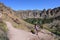 Young woman on Misery Ridge Trail in Smith Rock State Park, Oregon.