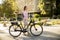 Young woman with modern city electric e-bike clean sustainable urban transportation