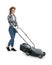Young woman with modern lawn mower on white background