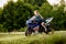 Young woman with a motorcycle speed